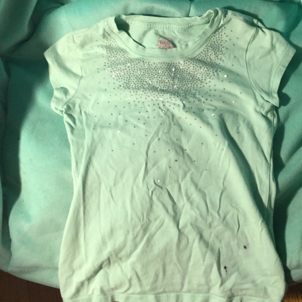 A mint sparkly shirt
